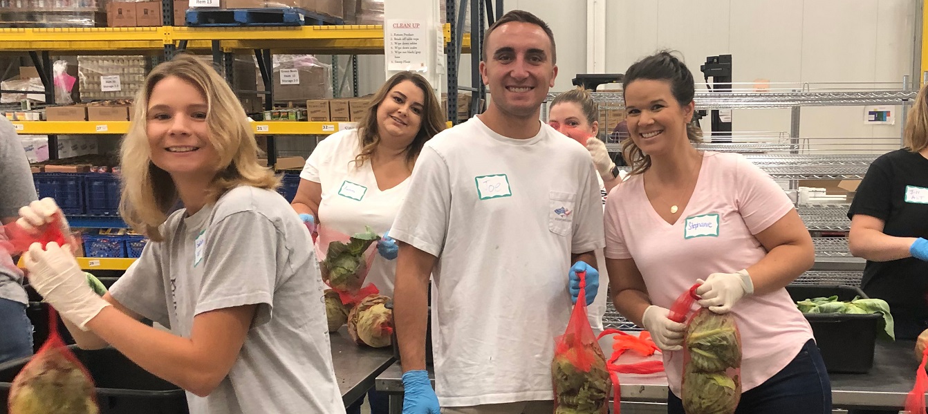 Team AST Gives Back at Northern Illinois Food Bank